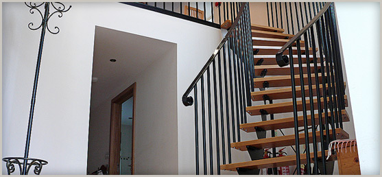 Wrought iron stair with oak treads